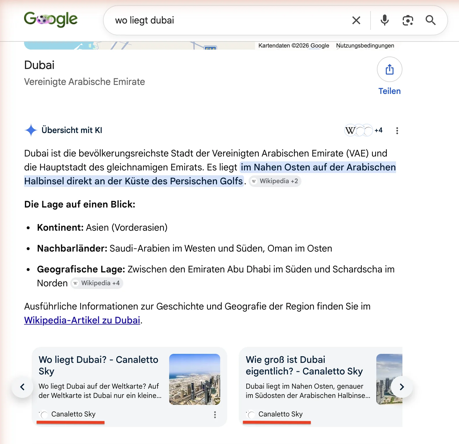 Google-KI-Übersicht zur Suchanfrage wo liegt dubai, die Website des Maklers erscheint als Quelle neben Wikipedia